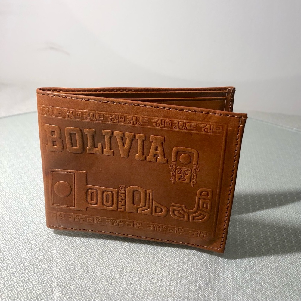 FREE W/purchase of $50 and up!          Leather Wallet made in Bolivia.